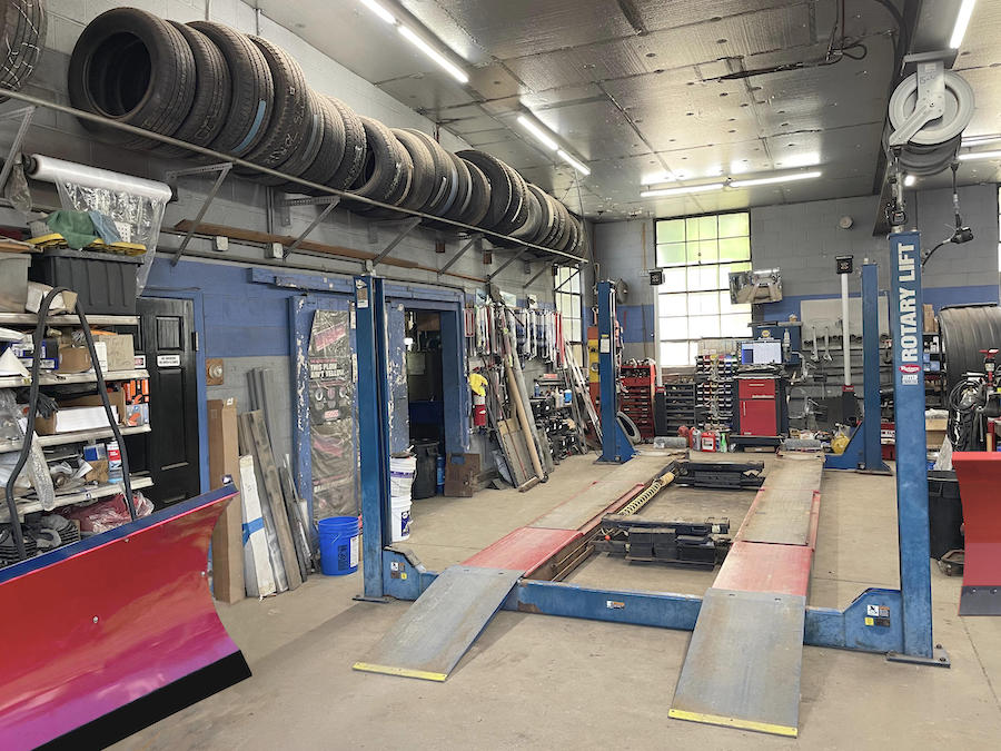 Our garage with a hydraulic car lift