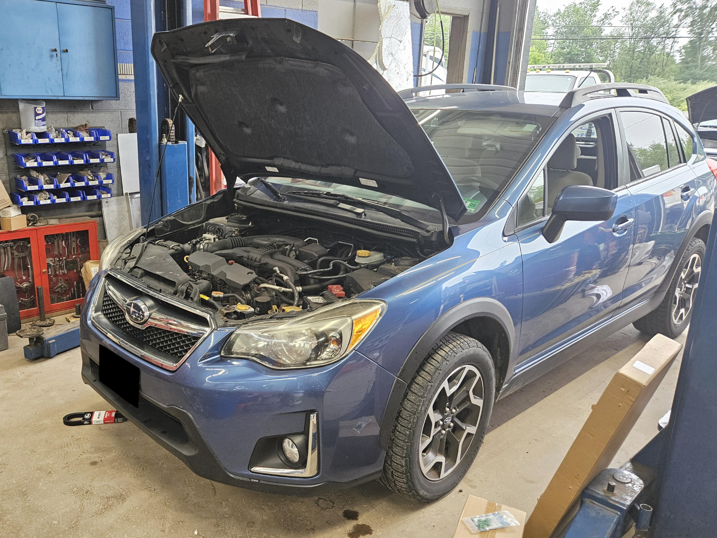Car receiving routine maintenance and oil change